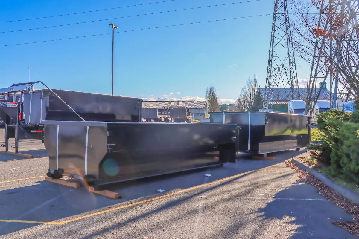 Roll-off dumpster ready for waste disposal at job site for 12 Yard Dumpster Rental in Monfort Heights
